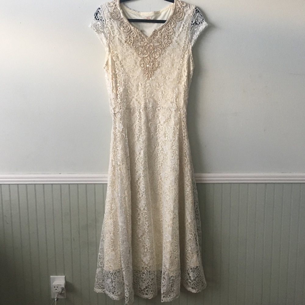 Long, lace cream dress